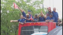 Puertorriqueños reciben como campeones a su equipo nacional de béisbol