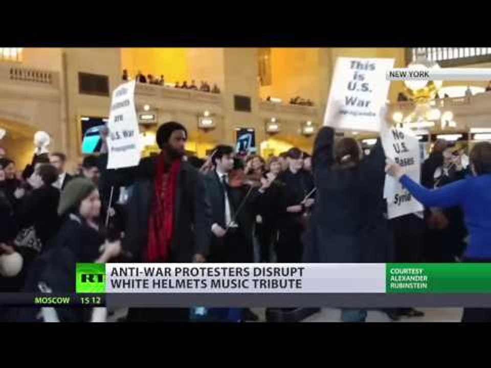 'USA Out Of Everywhere' Anti-Syrian-war protest disrupts White Helmets pop-up music tribute