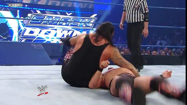 World Heavyweight Champion Undertaker vs. Unified Tag Team