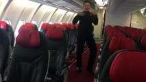 Flight Attendant Slays Re-Creation Of Britney Spears' 'Toxic' On Plane: Watch Viral Video