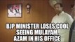 BJP minister Raza gets angry after seeing photo of Mulayam, Azam in his office | Oneindia News
