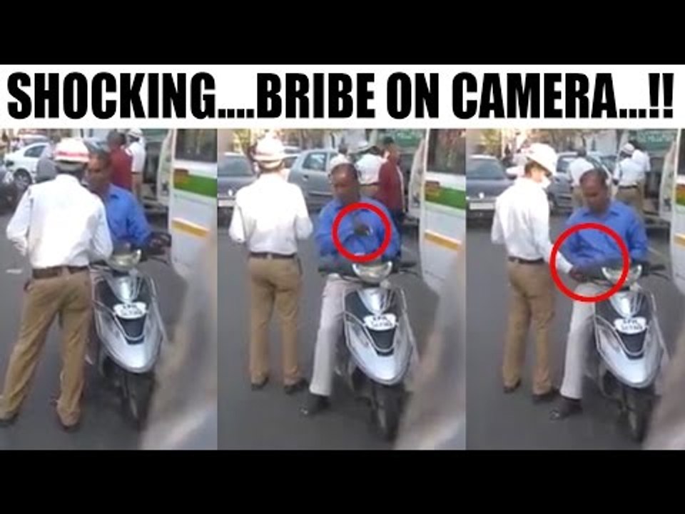 Hyderabad Traffic policeman caught taking bribe on camera | Oneindia News