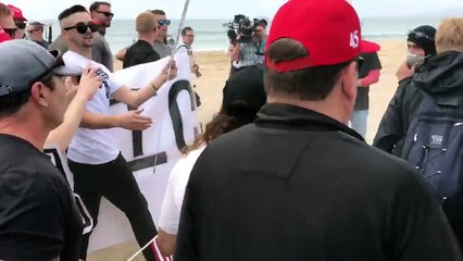 Brawl breaks out between Trump and anti-Trump protesters in Huntington Beach, CA