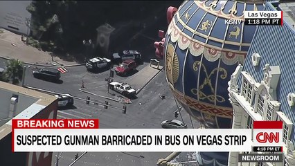 Suspected gunman barricaded in