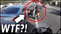 Angry driver hits motorcyclist with car door in road rage