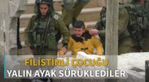 İsrailli askerler 8 yaşındaki Filistinli çocuğu yalın ayak sürükledi