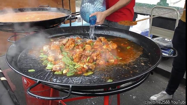Cooking Two Giant Spanish Paellas. Seafood and Chicken. Street Food of Brick Lane, London