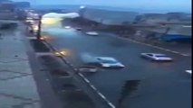 The astonishing moment lightning hits a car and sends it flying along the road at high speed