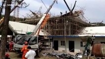 Scaffolding collapses burying 15 workers in central China