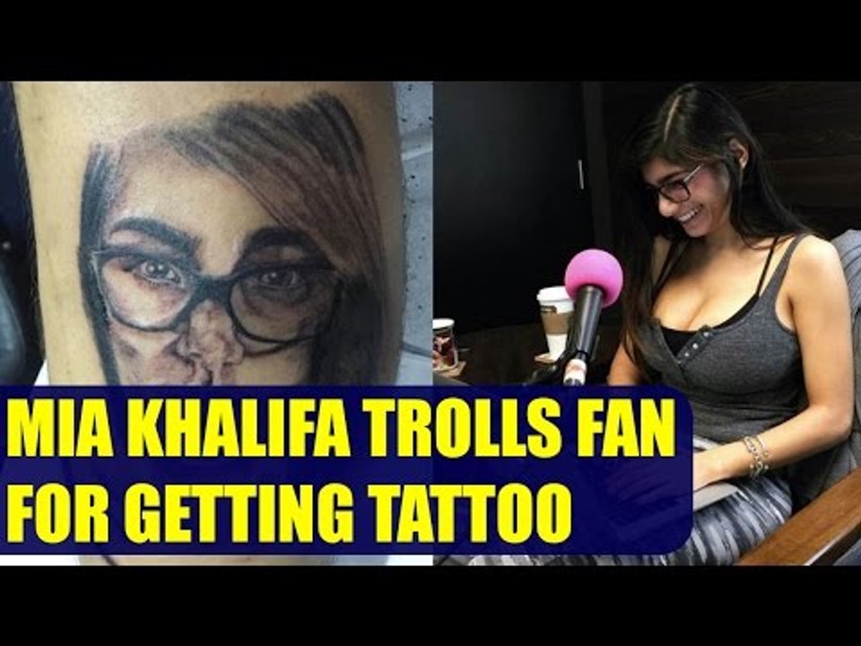 Mia khalifa with a fan