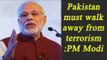 Pakistan must walk away from terrorism to indulge in dialogue-making: PM Modi|Oneindia News