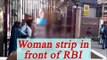 Delhi Woman takes off clothes at RBI gate in New Delhi | Oneindia News