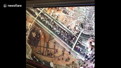 Mall escalator suddenly reverses injuring 18 in Hong Kong