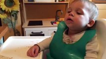 Baby tries his best to stay awake during dinner