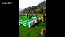 Chinese people play giant mahjong in tourist attraction