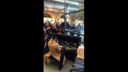 John Legend surprises commuters with performance