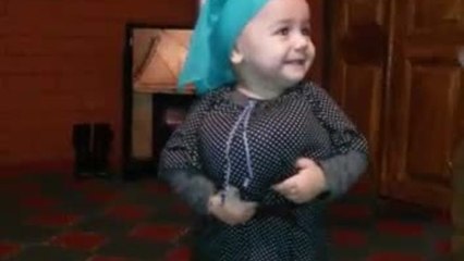 Baby dressed as old woman delights family