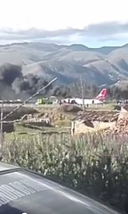 Black Smoke Rises From Wreckage of Peruvian Airlines Plane