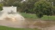 Man Can't Stop Laughing at Ute Driver Who Fails to Drive Through Flood Waters