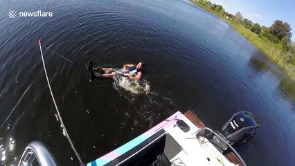 Man water skis on keyboards