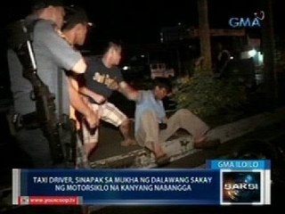 Saksi: Taxi driver sa Iloilo, sinapak ng dalawang naka-motorsiklo na kanyang nabangga