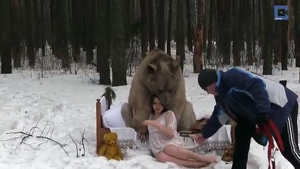 Russian Models Pose Next To Brown Bear