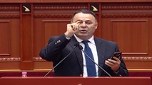 Report TV - Asllan Dogjani tenton  të godasë ministrin Ilir Beqaj