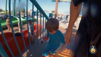 WATERPARK FUN While Getting Wet on Giant Water Slide Rides Race Challenge in Kids Family Fun Video-eioME9qRyVA