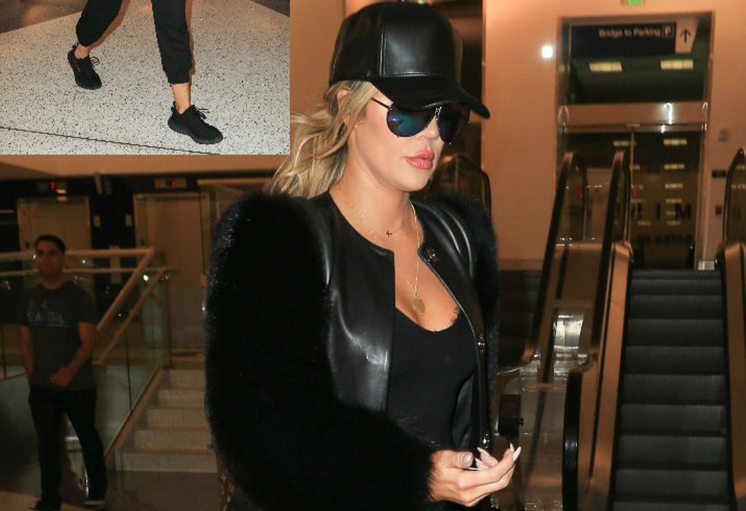 Khloe Kardashian Swarmed By Paps, Goes Ape At LAX