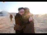 North Korea's TV report praises missile test, shows happy Kim hugging a man