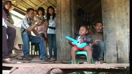 Indonesian baby on 40 cigarettes a day