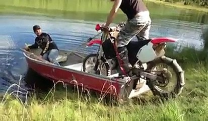 Driving a motorcycle on a lake Crazy guys !