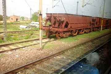 Skipping Tundla Raiway Station at Sedate Pace