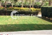 apartment for rent semi furnished in park view compound new Cairo with private garden