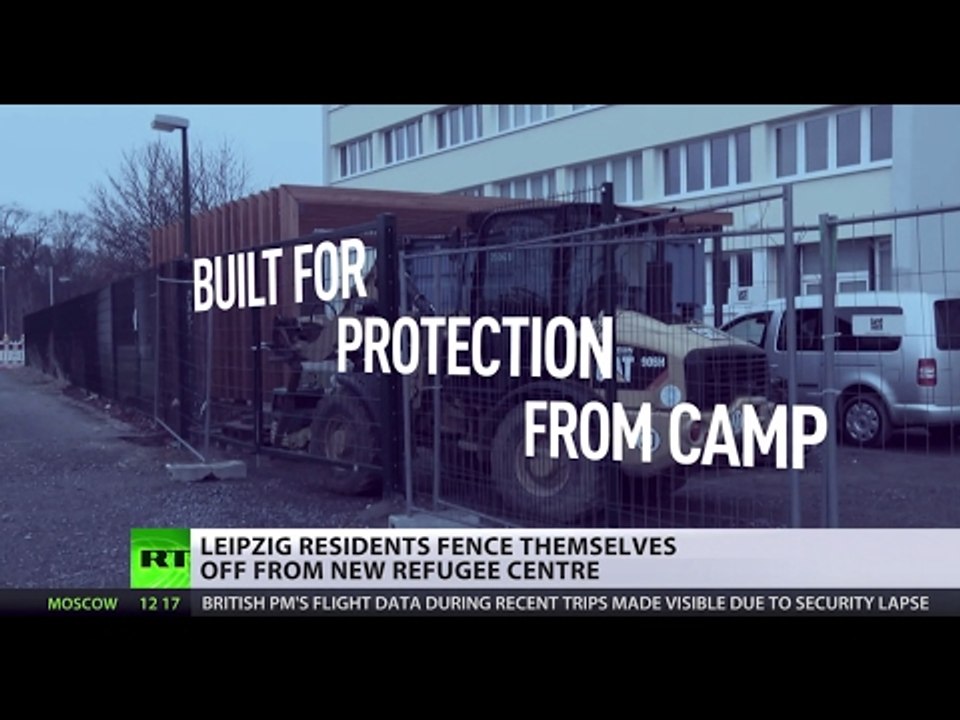 ‘Like a ghetto’: Leipzig condo fences itself off from refugee center