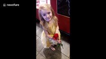 Cute girl has hilarious reaction after seeing Beauty and the Beast