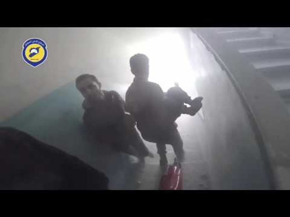 Rescuers Pull Children Out of Rubble Following Airstrikes in Eastern Damascus Suburb