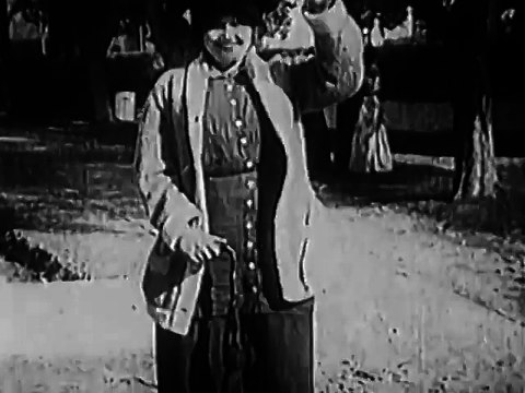 Charlie Chaplin - Between Showers (1914)