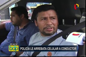 Policía le quita celular a conductor que lo grababa