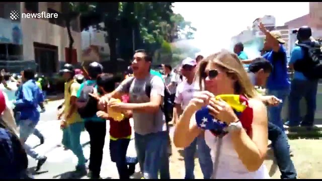 Protesters clash with police in Caracas, Venezuela