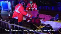 Over a dozen injured in Hong Kong after tram flips over