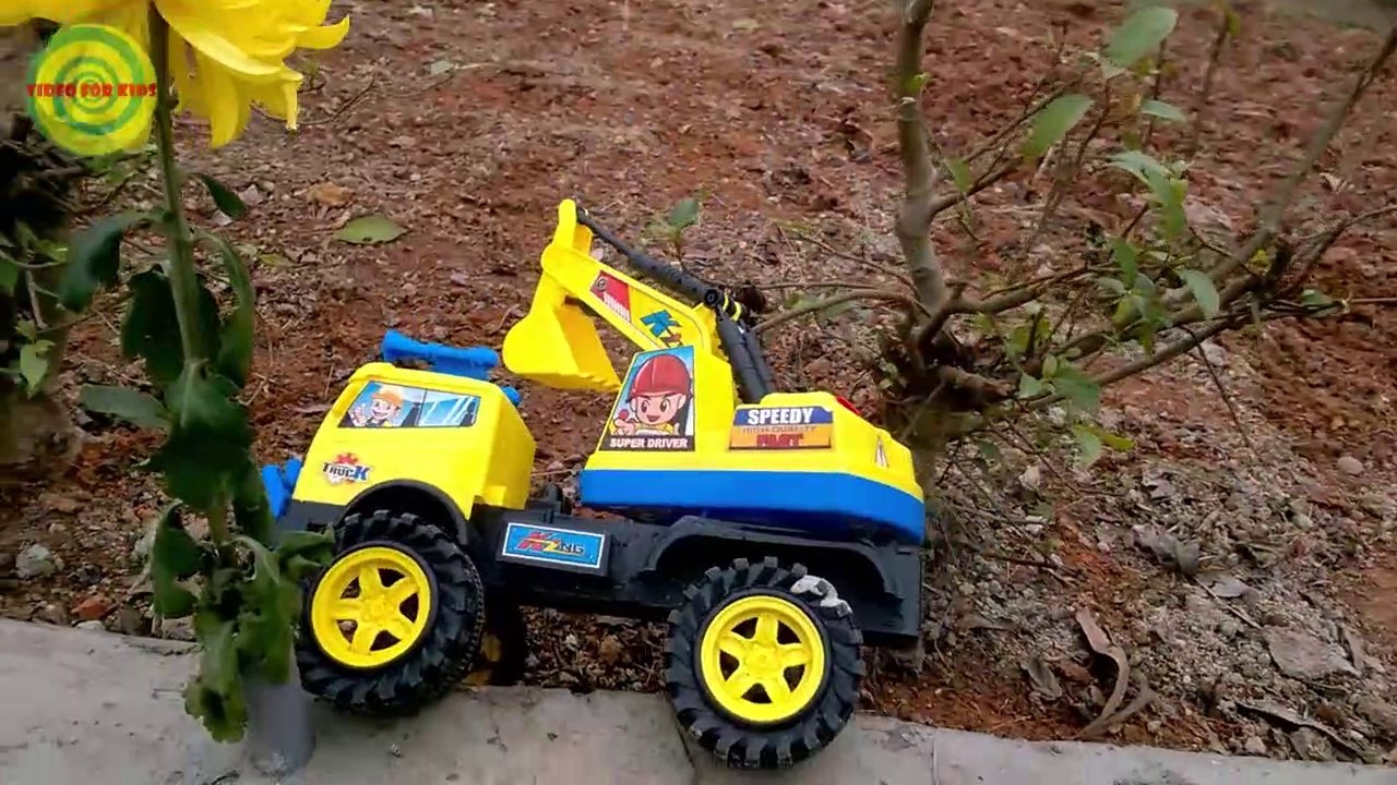 Excavators for kids _ Baby playing excavators destructive the yellow flowers   Toy for children-1j