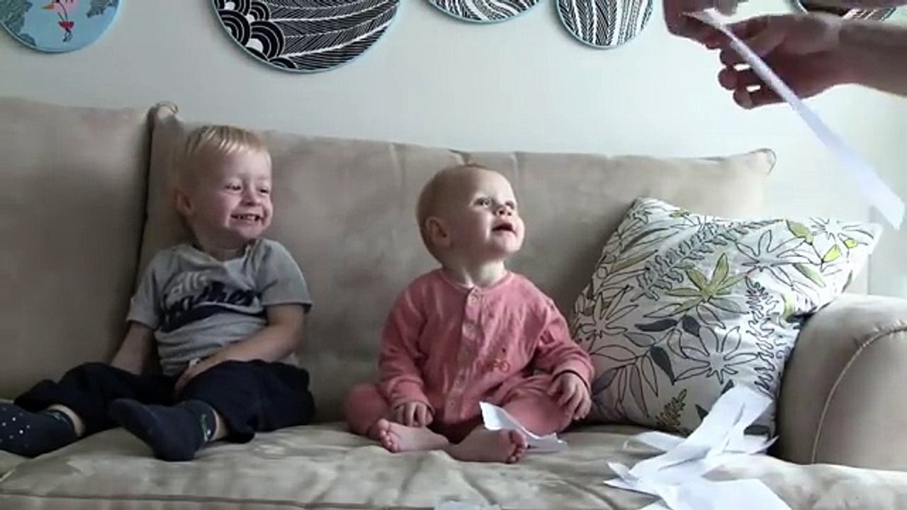 Baby Laughing Hysterically at Ripping Paper with Little Sister
