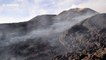Rivers of lava flow onto slopes of Volcano Etna