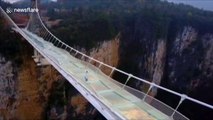 Tai Chi master gives martial arts performance on the world's highest glass-bottom bridge