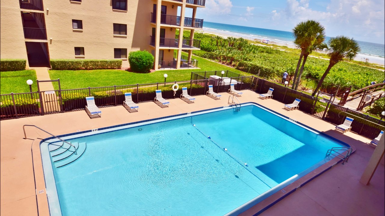 FLORIDA PARADISE JUST STEPS TO THE BEACH Presented by Pittner Real Estate