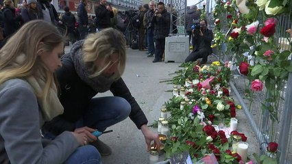 A day of mourning for Sweden as Crown Princess lays flowers