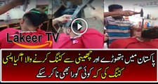 A Pakistani is Doing Hair Cutting With Hammer