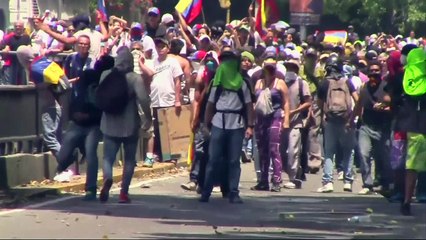 Shocking scenes as police force back Venezuela protesters