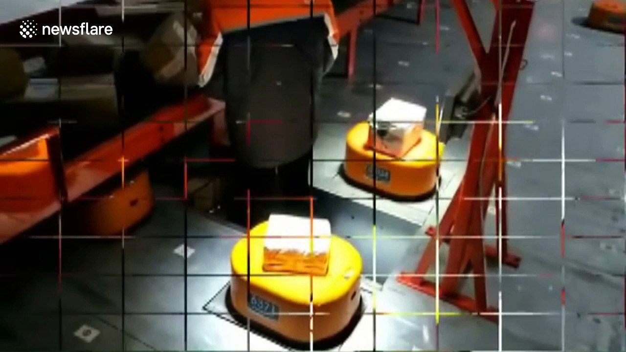 These robots sort packages incredibly efficiently